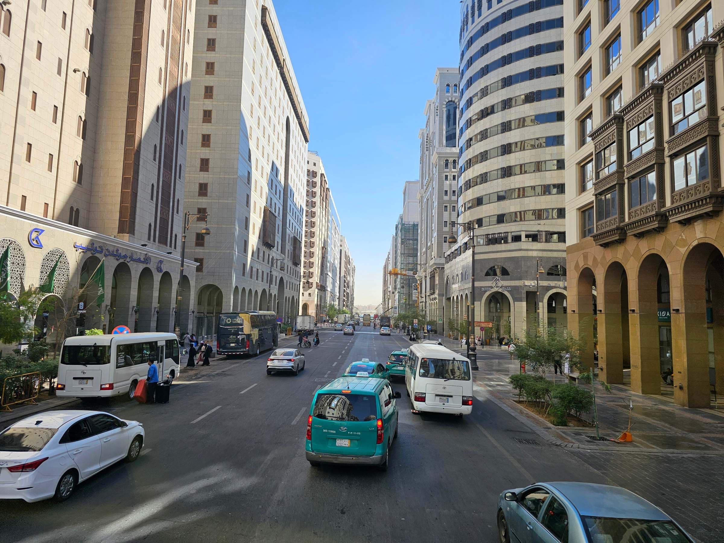 Hotels and taxis on a street near the Prophet's Mosque, Madinah